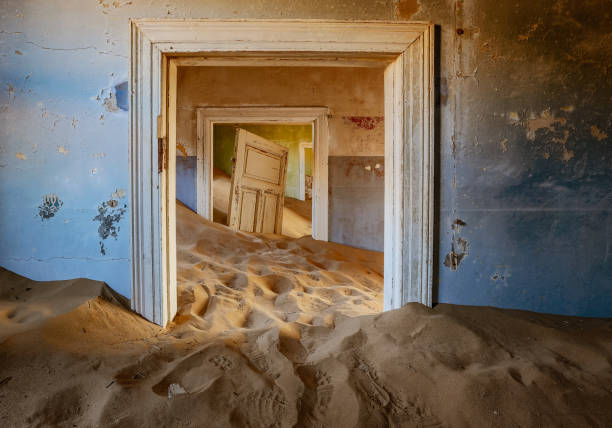 Sand has invaded and taken over these rooms in Kolmanskoppe, Namibia